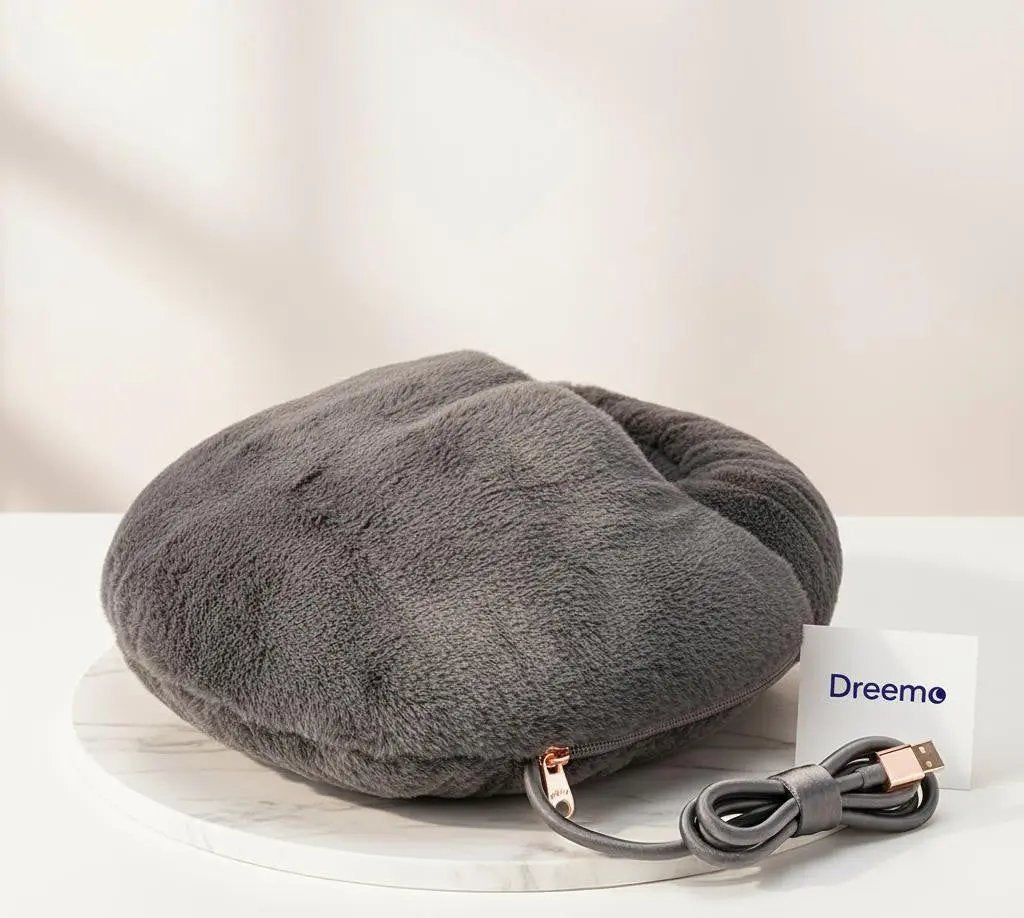 Gray Foot Heating Pad with a cable on a white surface